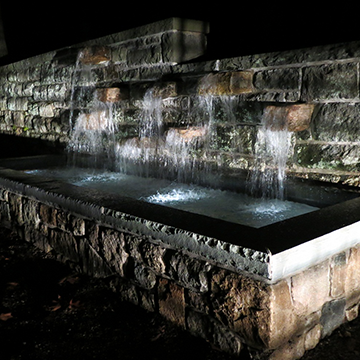 Illuminated stone water feature